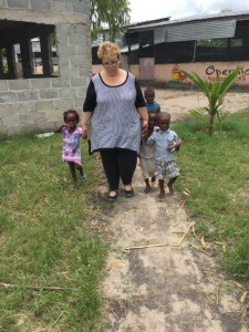 Picture of Mel walking with kids