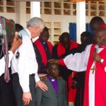 Mboka kneeling for prayer (1)