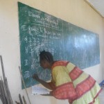 2014-06-14 teacher writing exam on blackboard [1600×1200]