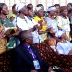 2 Pastors wives singing Yesu Ndeko na Bolingo – Mama Duale lower right
