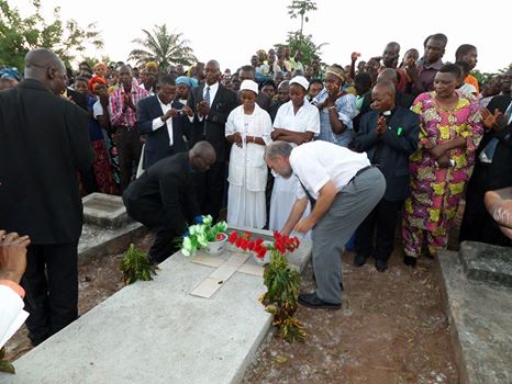 Laying flowers this week at Paul's grave in Congo.