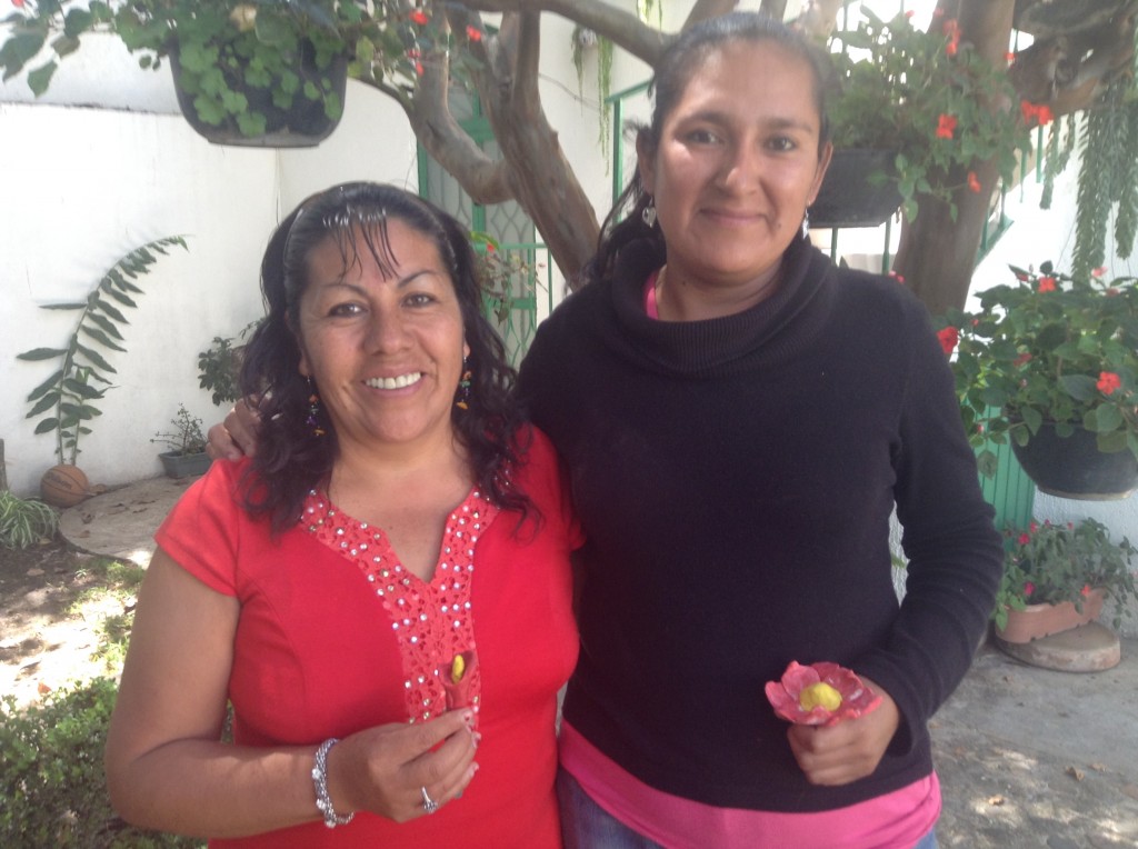 Sofia and Rosa with their clay creations after a reflection on God as our Potter 