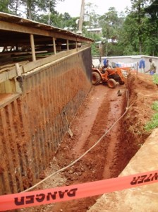 Digging out the containers along the side of the Industrial Arts area