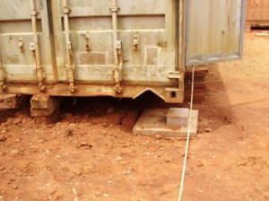 New footing poured under one of the containers