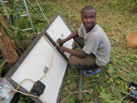 Marius checking the wiring on the back of the solar panels