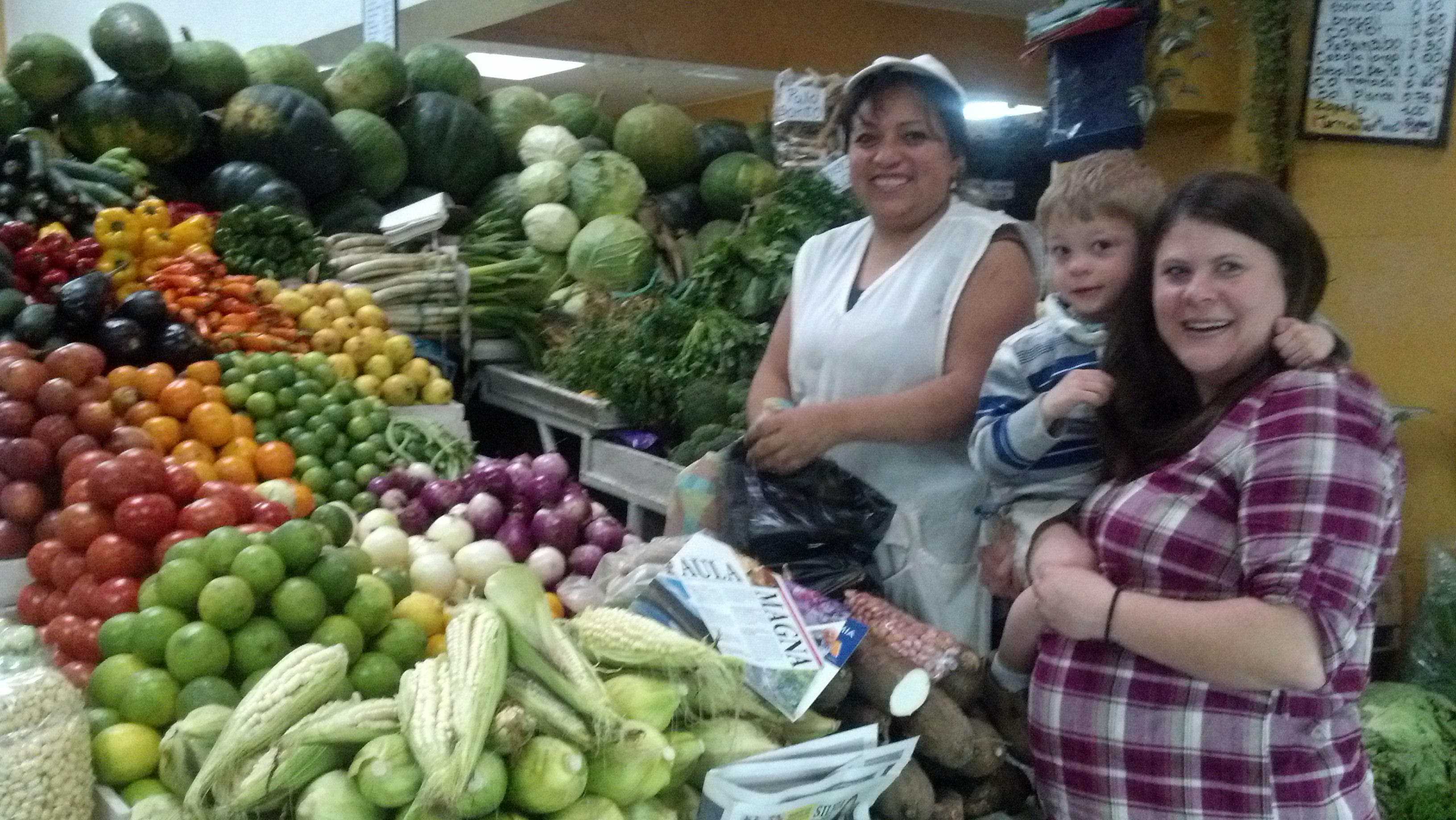 Us at the market with our favorite vegetable lady!  She's so nice!