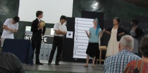 The students performed a series of  gangster skits between courses