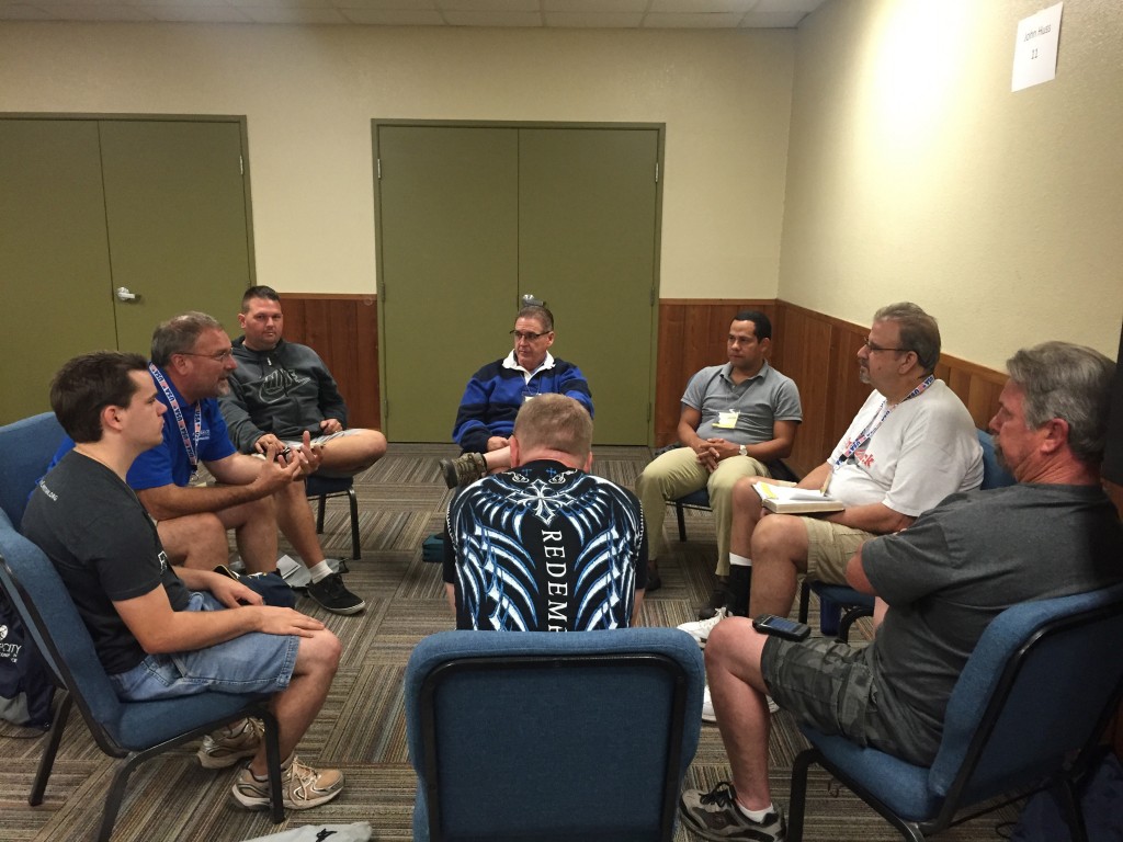 Small group time during the men's retreat