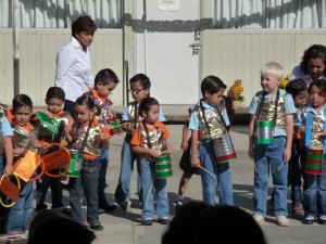 Lucas ready to rock the coffee-can drum at his kindergarten graduation in June.