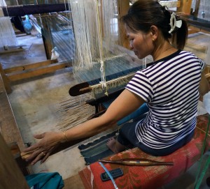 Women in Southeast Asia receive paying jobs working with silk.